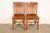 A gorgeous pair of antique Mission or Arts & Crafts period quarter sawn oak spindle back side chairs or dining chairs In...