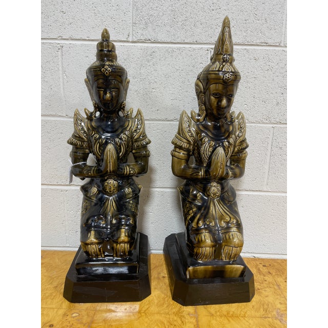 Very cool large ceramic Buddha’s in a mottled drip sort of glaze finish. Greens and black. Black wood painted bases are...