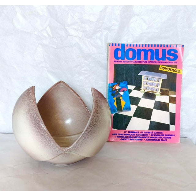 Made in Italy , 1970s. It is made in brown glazed ceramic and it's attributable to Giovanni Bertoncello for its design....