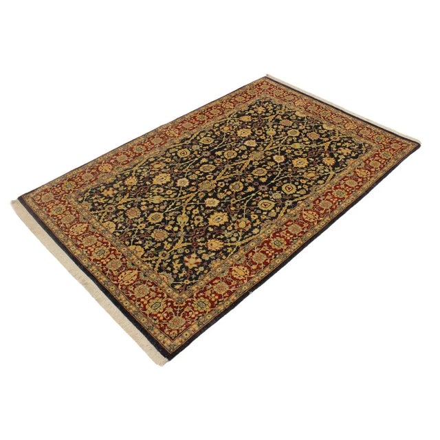 Designed with a mesmerizing intricate traditional motif this glorious hand knotted rug is a masterpiece that will fill any...