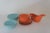 A cheerful sunset orange and baby blue set of Rayalon Inc Melamac dinnerware from the 60s. Consists of 7 blue bowls(6.25in...