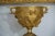 Circa 1830 magnificent rare pair of gilt bronze exuberant Classical Roman style decorated urns with highly raised finely...
