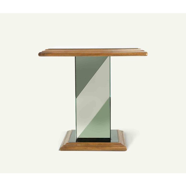 Vintage coffee table realized by italian manufacture in 1970s. Wood, glass and metal. Excellent condition.