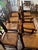 Set of 8 Eastlake circa 1890 dining chairs with woven seats & purple covers to protect the weave. They captain chair is 21...