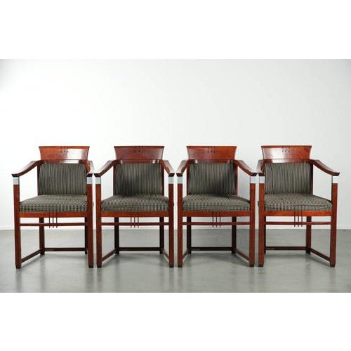 We are offering this set of 4 Schuitema design dining chairs with armrests from the Decoforma series, all in good...