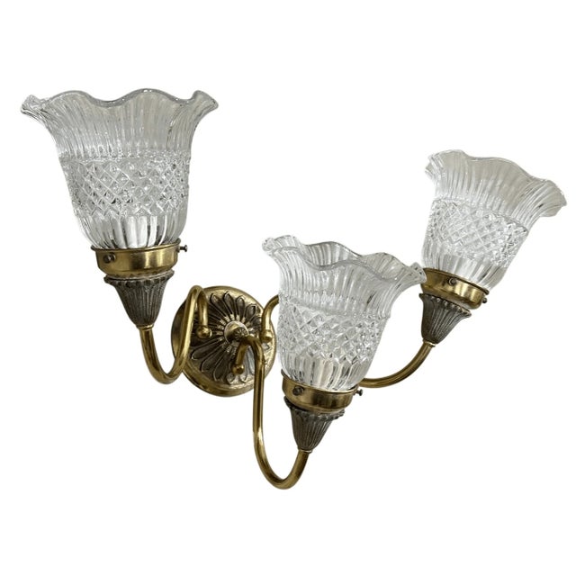 Good condition Elevate your space with this charming vintage 3-light wall sconce, exuding classic elegance and intricate...