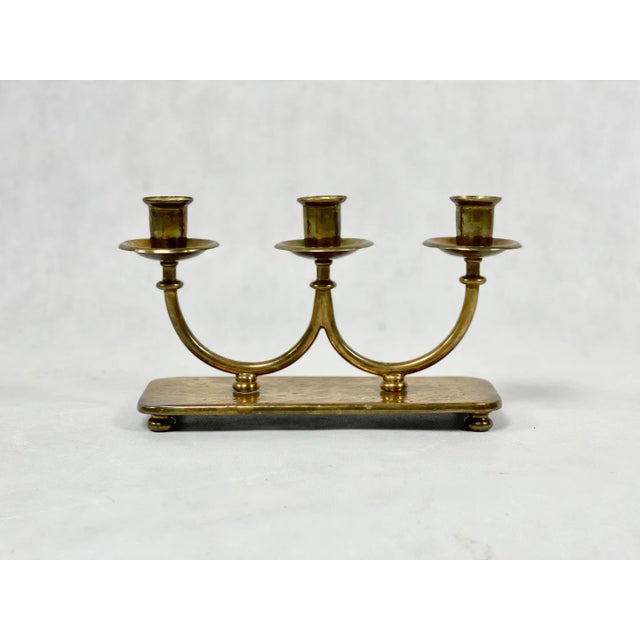 Candlestick from the interwar period, unmarked. The item is preserved in very good condition, without damage, with a...