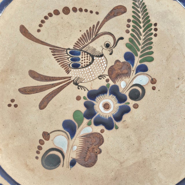 This vintageTonala shallow bowl is a beautiful example of Mexican stoneware pottery. It can be used as a bowl or...