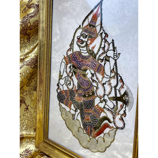 This leather panel is pierced into filigree by hand and painted cell by cell in aubergine, terracotta, moss and ivory,...