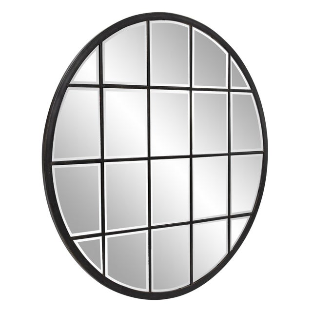 The round Superior Mirror resembles a beautifully paneled window. The metal frame is finished in an oil rubbed bronze to...