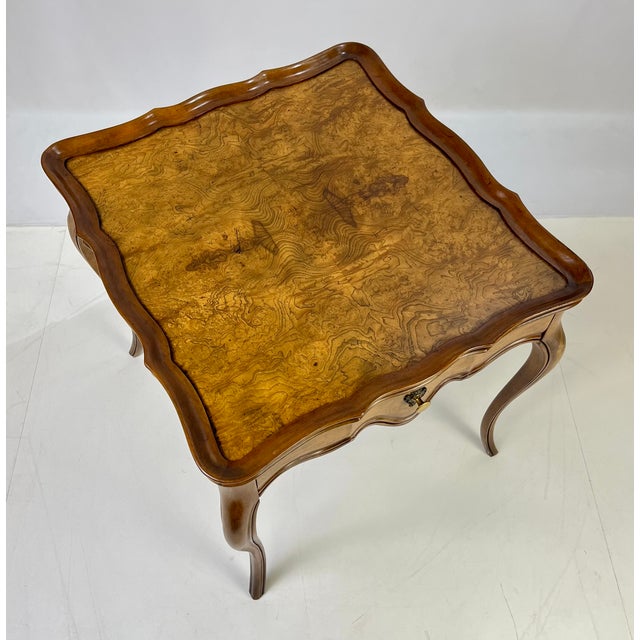Exceptional French Provincial Louis XV style tea table or occasional side table by Baker Furniture. This versatile accent...