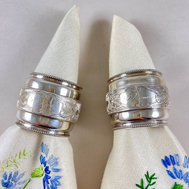 A wonderful and special pair of Sterling Silver barrel shaped napkin rings, American, circa 1890. Most likely presented as...