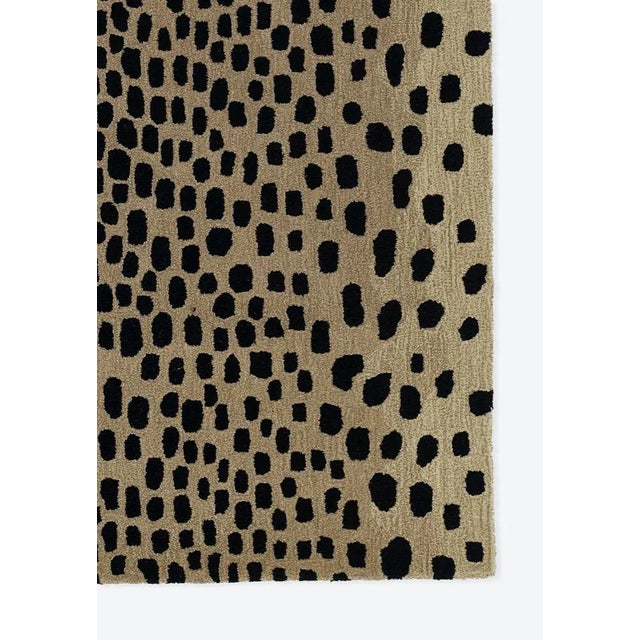 A classic style, redefined. This cheetah print rug from the Woodland Collection by Erin Gates is hand-tufted from 100%...