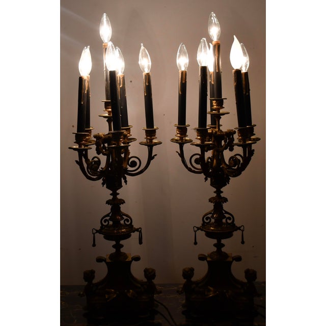 We are pleased to offer this beautiful pair of Antique French Louis XV Candelabra/ table lamps, from the 1900s. item...