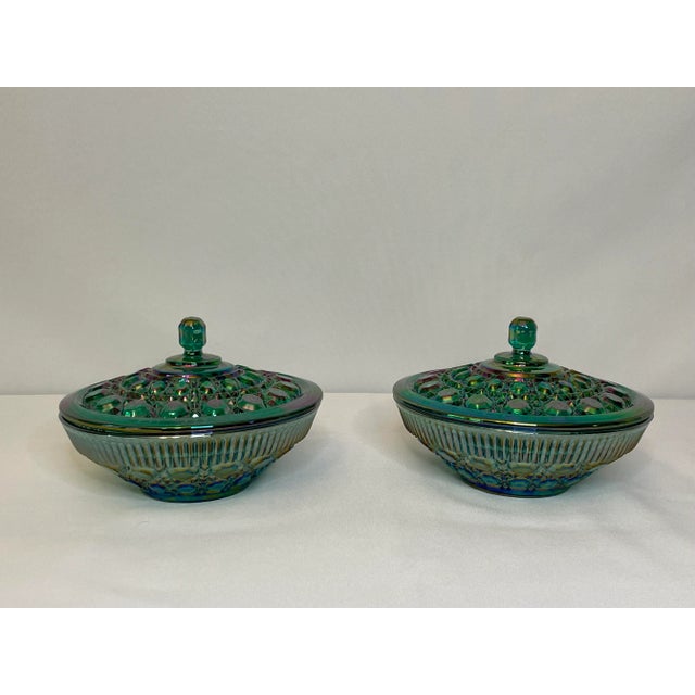 Discover the charm of vintage glassware with this stunning Indiana Glass Company multi-color carnival glass dish in the...