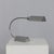 A refined table lamp attributed to cedric hartman, dating to the 1970s. Executed in polished nickel, the design is defined...