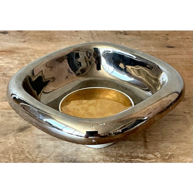 Presenting a sleek and stylish vintage Italian metallic ceramic bowl, a testament to sophisticated Mid-Century Modern...