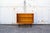 Sideboard with wooden frame and iron legs. Designer Leonardo Fiori Manufacturer ISA Bergamo 1950s This piece has an...