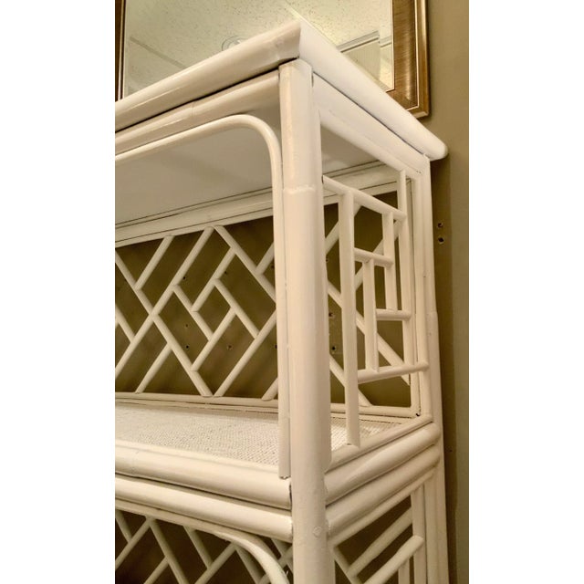 Stylish Asian inspired Organic Modern White Wood Etagere, rattan shelves, showroom floor sample