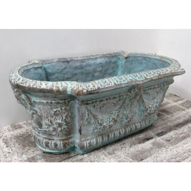 Vintage: French, Mediterranean-style, outdoor concrete garden planter, emblazoned with relief details, such as; festoons,...