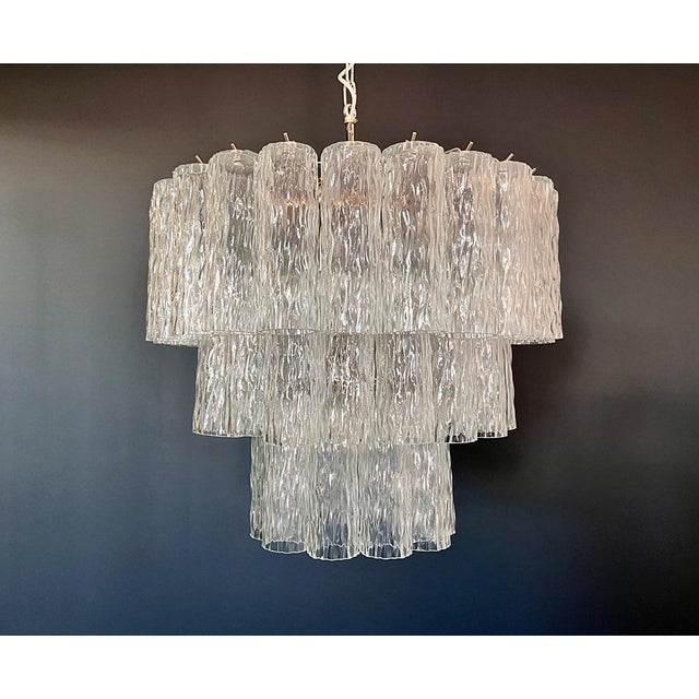 Italian vintage chandelier in Murano glass and nickel-plated metal structure. The polisched nikel armature supports 52...