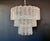 Italian vintage chandelier in Murano glass and nickel-plated metal structure. The polisched nikel armature supports 52...