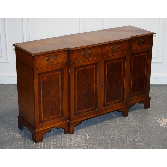 A fine vintage burr walnut sideboard, made by Jan Smith of Brighton, beautifully crafted with a rich and decorative walnut...