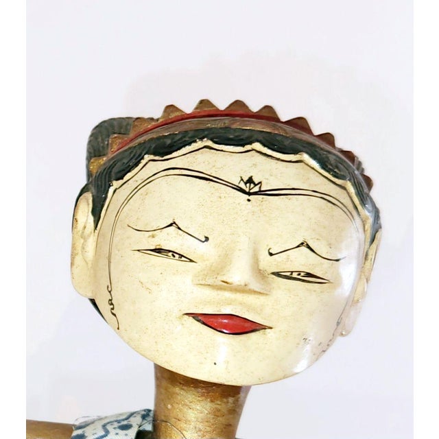 Original Cirebon (West Java) Wayang Golek puppets Wood block stands are included. The hands are controlled by wooden...