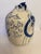 This vintage abstract style vase designed with blue and white features depicting birds and feathers is truly unique. Age...