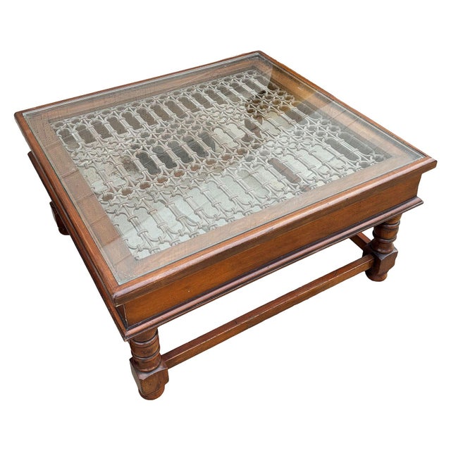 A striking example of late 20th century Anglo-Indian furniture, this coffee table seamlessly blends Indian architectural...