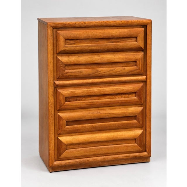 Vintage Mid-Century Modern tall chest of drawers by Bassett Furniture. Features a warm walnut finish with distinctive...