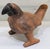 A striking hand-formed terracotta bird effigy vessel in the tradition of Mexican folk art pottery, marked "Mexico" with...
