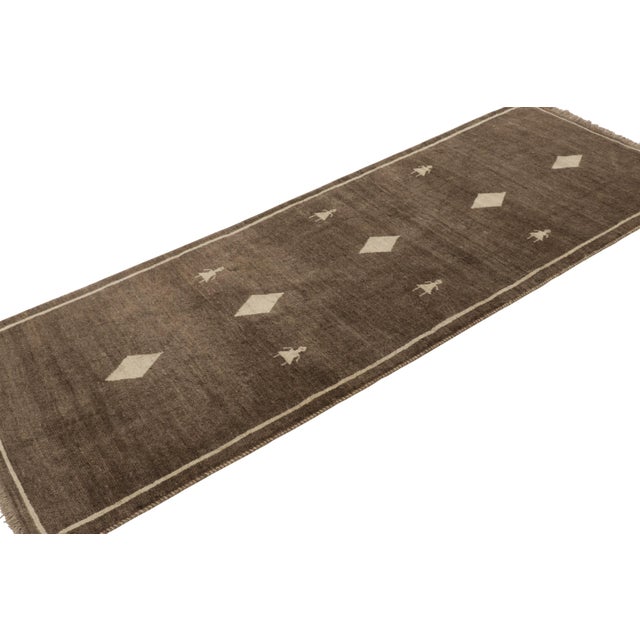 This vintage 3x9 Persian Gabbeh runner rug is the latest grand entry to Rug & Kilim’s curation of iconic tribal pieces....