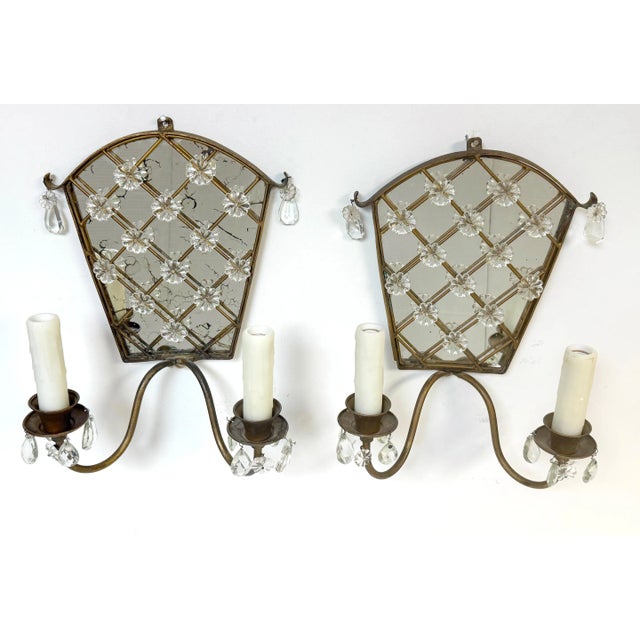 Pair of Maison Baguès Mirrored Brass Pagoda Trellis 2-Light Wall Sconces, France, 1950s This pair of Maison Baguès...