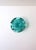 A sculptural Italian Murano art glass bowl in a saturated green hue, executed with a controlled bubble interior and an...