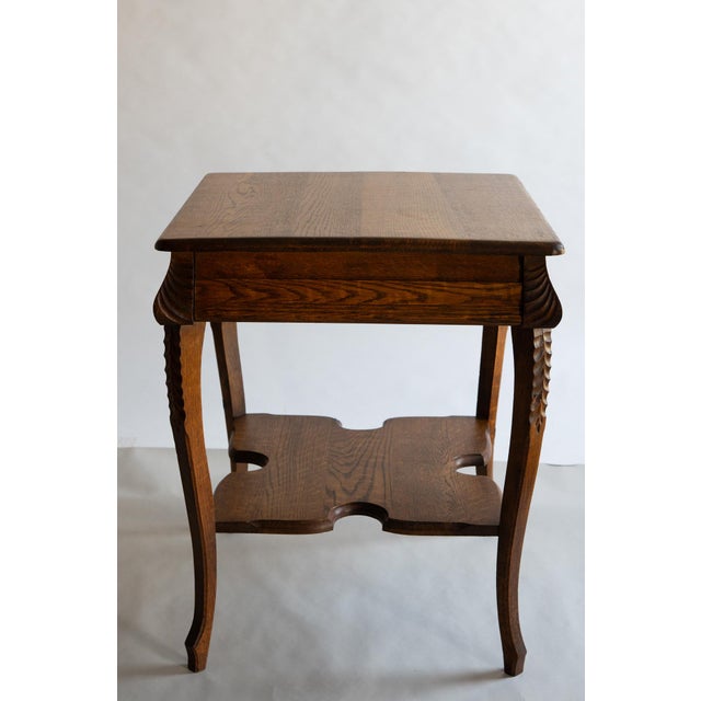 Sturdy well made exceptional side parlor table. Delightful craftmenship. I'm not sure of the maker or where it was made....