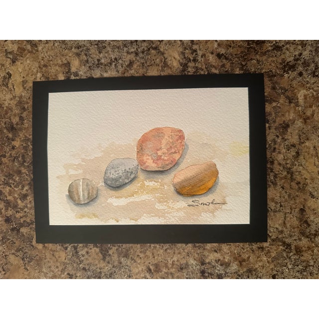 Watercolor on paper, mounted on black cardstock. A study in subtle color and texture, this painting captures the simple...