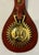 This leather strap was hung from horse saddles/harnesses during parades or other special events. Some of the medallions...