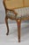 Vintage French Louis XV Style Distressed Gold Gilt Cane Back Vanity Bench Seat For Sale - Image 11 of 18