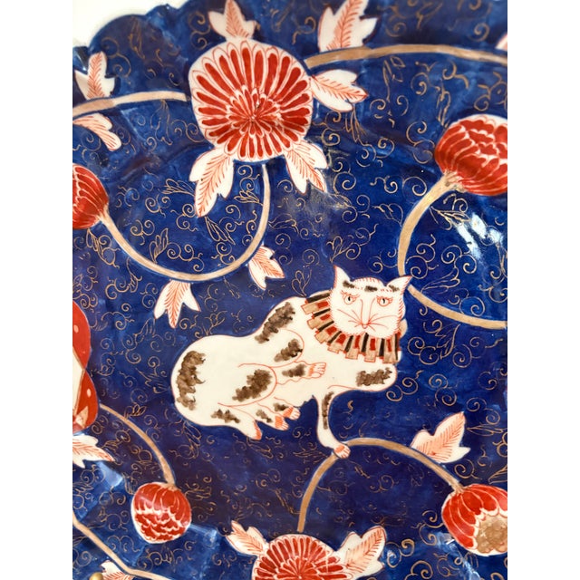 Amazing rare Meiji period (1868-1912) Imari pattern with a cat. Typical blue and orange pattern of Imari, but with a...