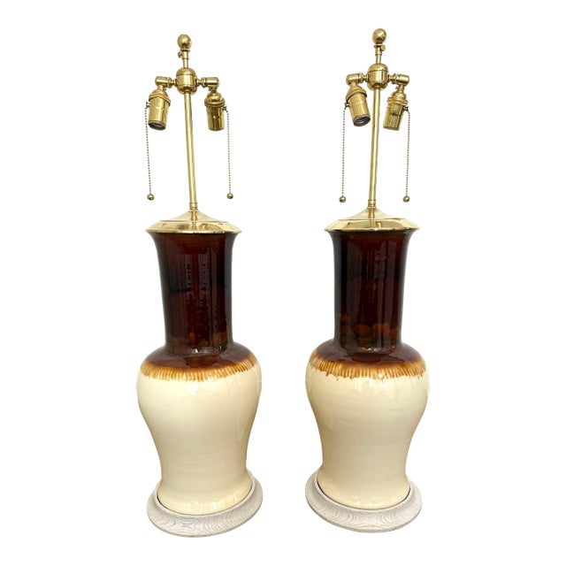 Christopher Spitzmiller table lamps, The "Garniture" lamp in Amber Ombré glaze. Bleached oak base. Double brass socket and...