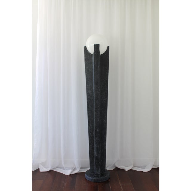 Vintage 80s art deco floor lamp. Super heavy faux stone base with glass orb shade. Measurements: 66" Height 12" Width 11"...