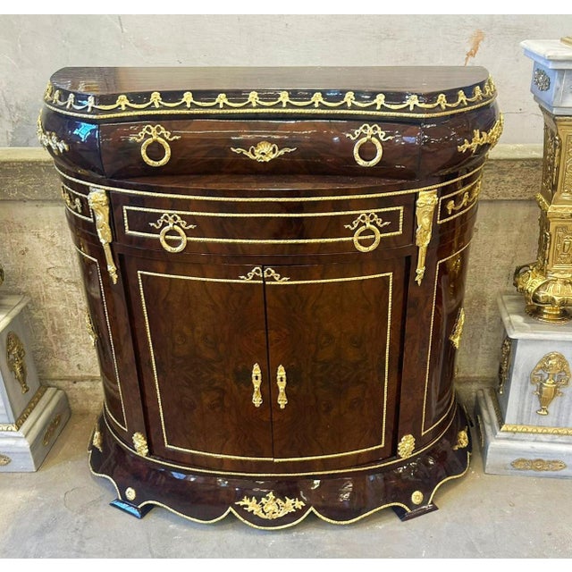Feel like royalty with this beautiful copper dresser with gold leaf details. Stunning French commode. Has a beautiful gold...