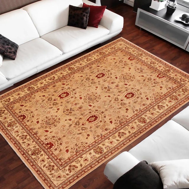 "Enhance the ambiance of your home with this magnificent Persian-influenced Turkish hand-knotted rug made by skilled...