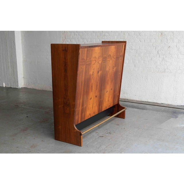 This danish dry bar was designed by johannes andersen and produced by skaaning & søn in the 1960’s. The clean, elegant...