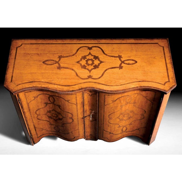 Handcrafted in Italy, this Louis XIV style credenza is constructed from solid cherry and cherry veneers. The serpentine...
