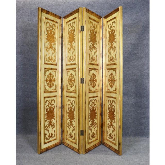 This refined Florentine four-panel dressing screen, crafted in Italy during the 1940s, is a beautiful example of mid-20th-...