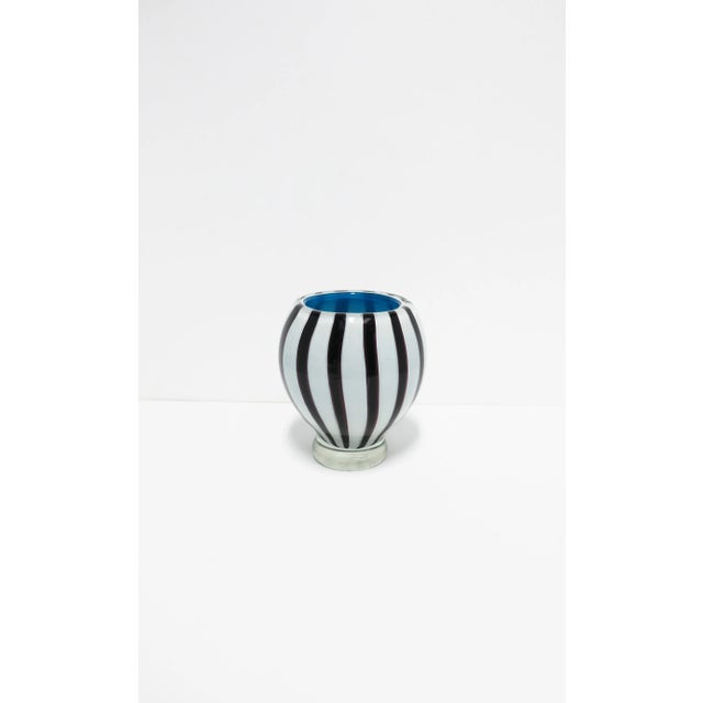 A very beautiful and substantial Italian Modern or Midcentury Modern Murano art glass vase, circa mid-20th century, Italy....