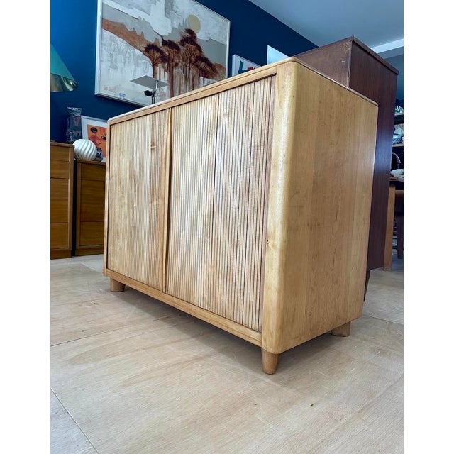 This Model M-178 tambour front 4 drawer chest was made between 1947-1948 making it a hard to find design. Designed and...