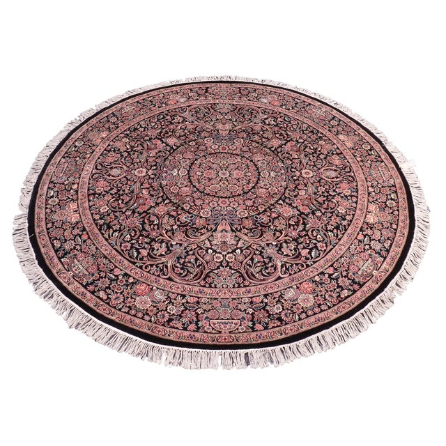 This hand‑knotted Pak Persian round rug showcases the finest expression of traditional Persian artistry. Each piece is...